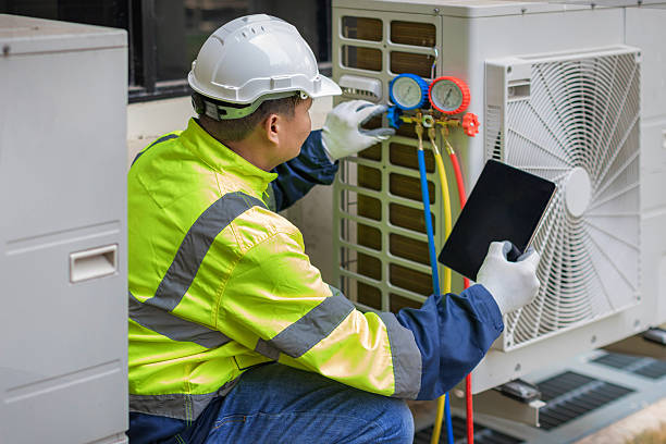 Professional Hvac technician working in Ayer, MA